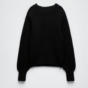 BRAND NEW. Round neck textured sweater with balloon sleeves.
